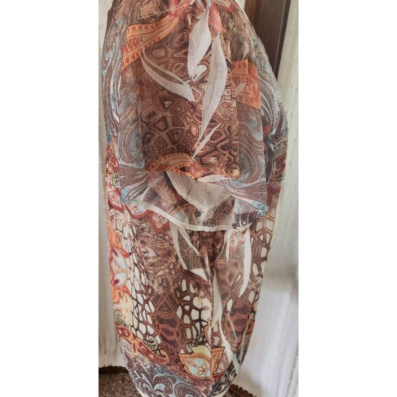 F86 One World 'live and let live' orange and brown with sparkly silver stud deco - Picture 11 of 11